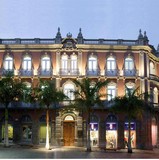 <div class=lightGallery-captions><p>Fachada de la sede principal de MAC</p><p></p><h4>Material cedido por 272 - MAC</h4><span></span></div>